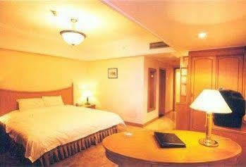 Jin'Gu Hotel Харбин Номер фото